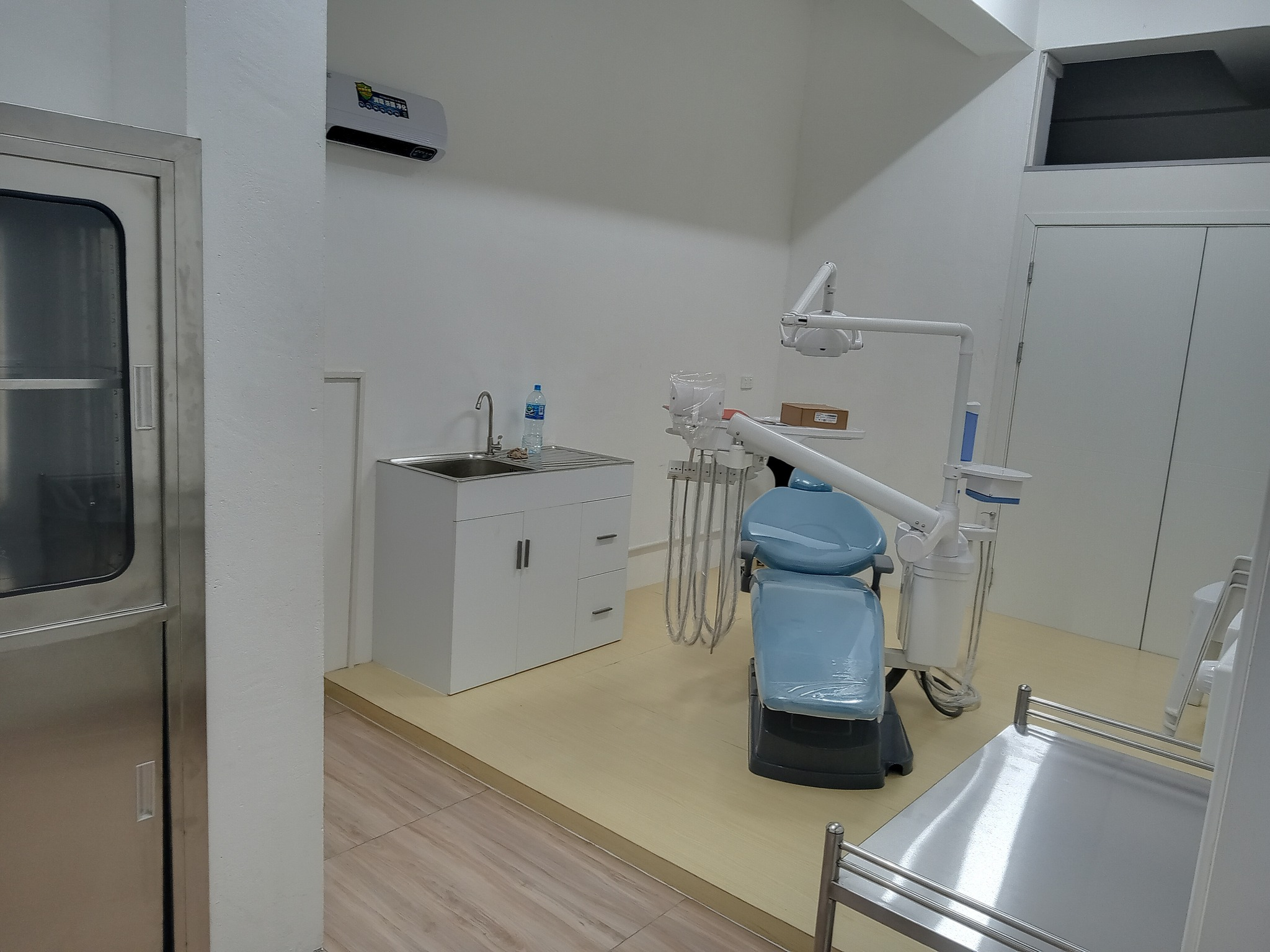 Dr. Lazarus Tavichikai providing medical consultation